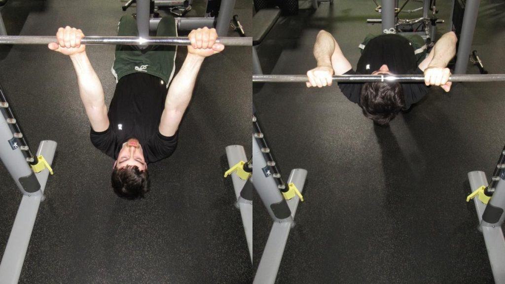A man doing an inverted curl for his biceps