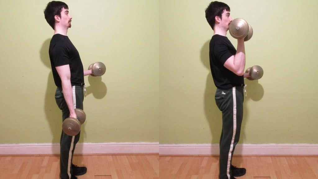 A man performing iso curls for his biceps