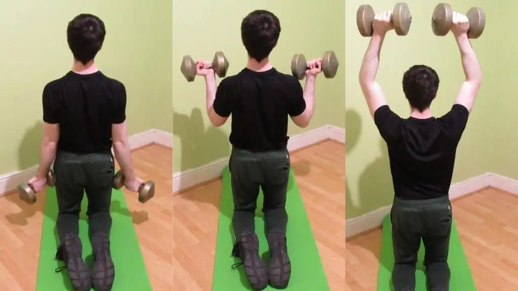 A man doing a kneeling bicep curl to press