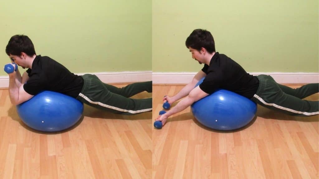 A man performing a lying exercise ball curl for his biceps