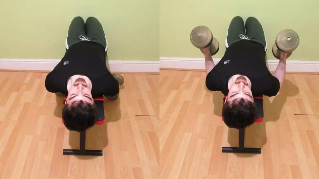 A man doing a lying hammer curl