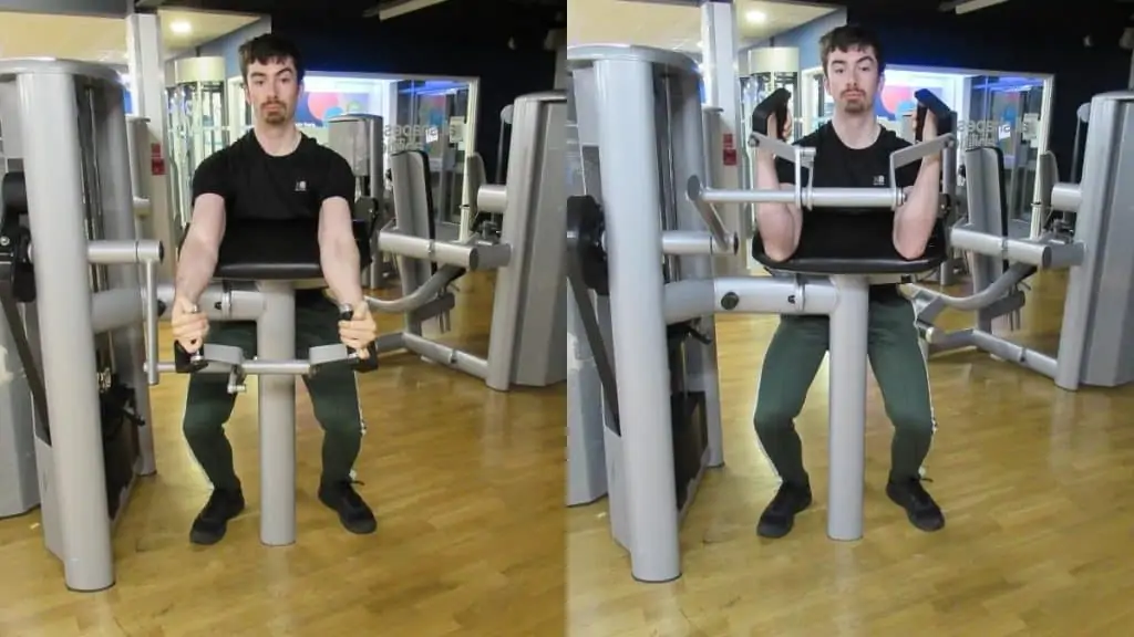 A man performing a machine hammer curl for his biceps