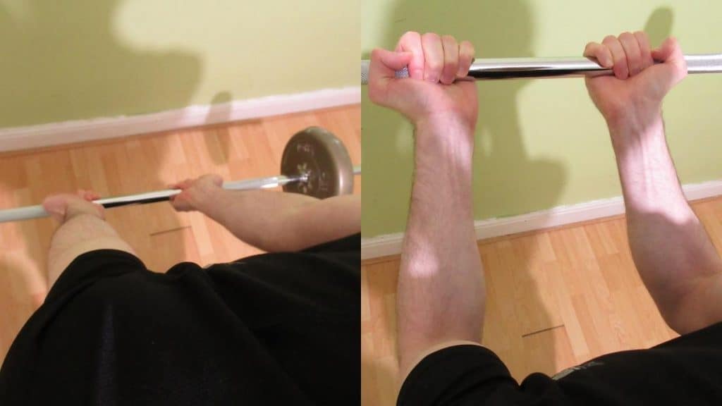 A man doing narrow grip barbell curls for his biceps