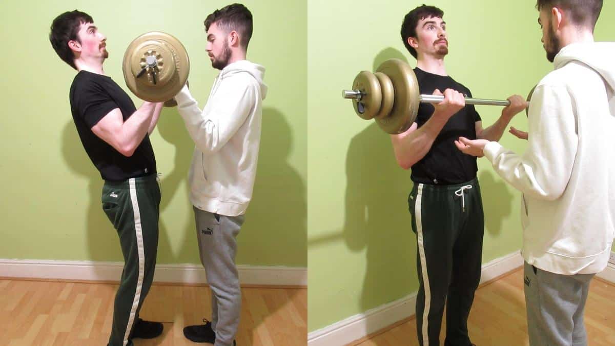A man doing negative curls for his biceps