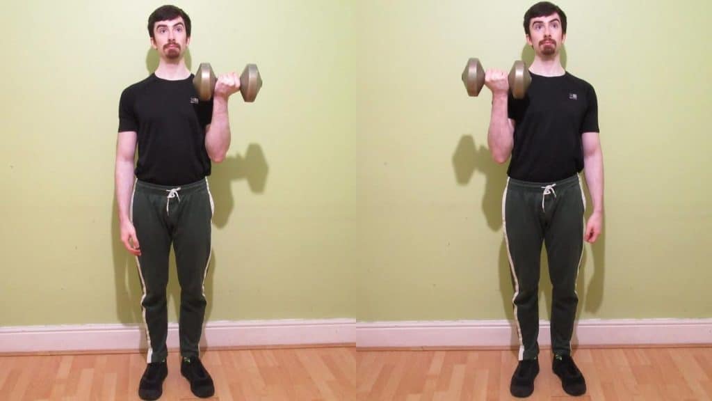 A man doing one arm curls for his biceps with a single dumbbell