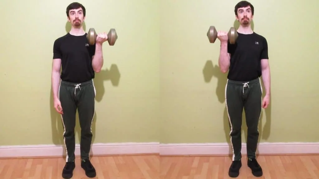 A man doing one arm curls for his biceps with a single dumbbell