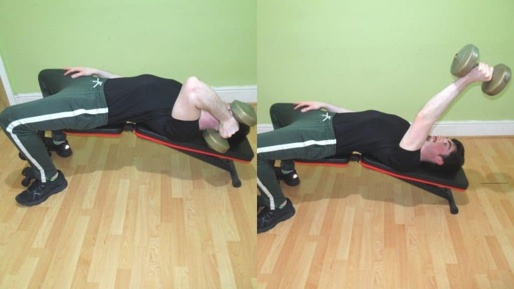 A man doing a one arm decline triceps extension