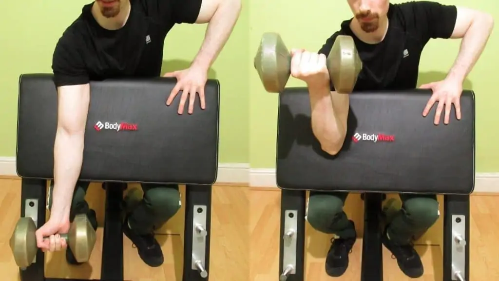 A man doing a one arm dumbbell preacher curl