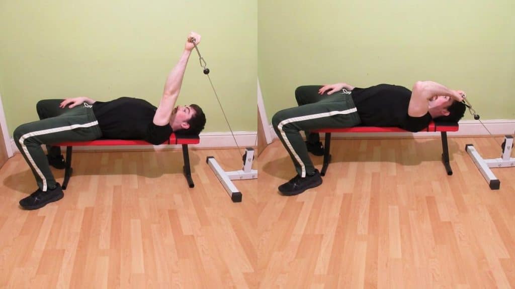A man performing one arm lying cable extensions for his triceps