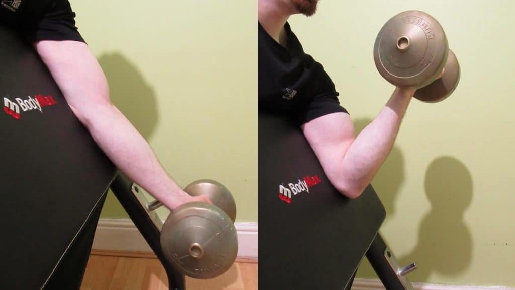 A man doing a one arm preacher curl with a single dumbbell