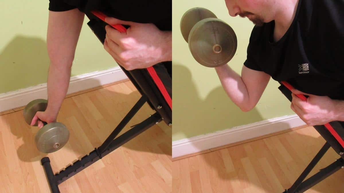 A man performing one arm spider curls for his biceps