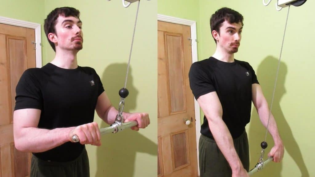 A man doing an overhand cable pushdown to work his triceps