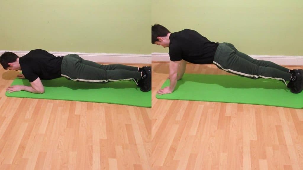 A man performing a plank to triceps extension