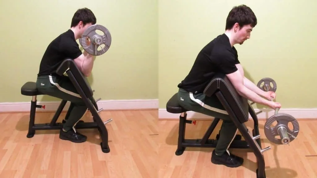 A man doing preacher curls with a close grip