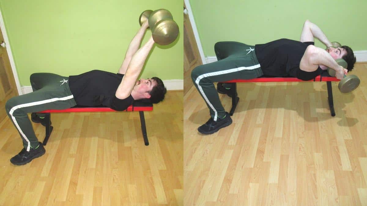 A man doing a pronated skullcrusher with dumbbells
