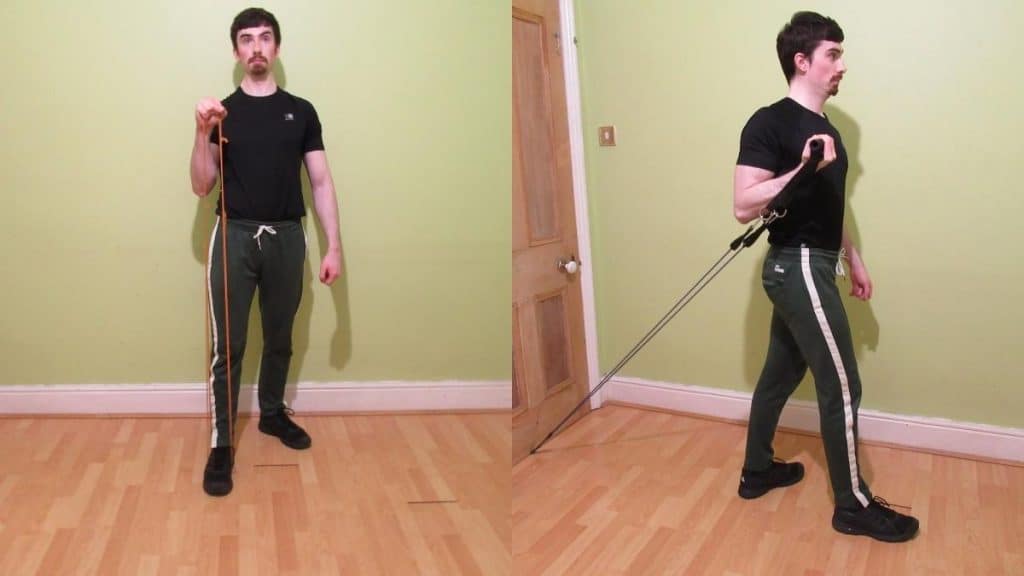 A man doing some resistance band bicep exercises during his workout