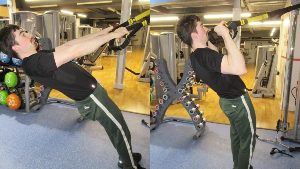 A man performing a reverse curl on a TRX