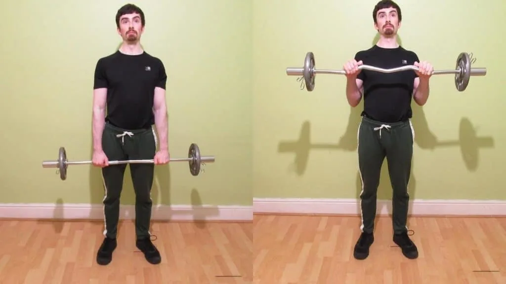 A man performing a reverse grip EZ bar curl (aka an overhand EZ bar curl)