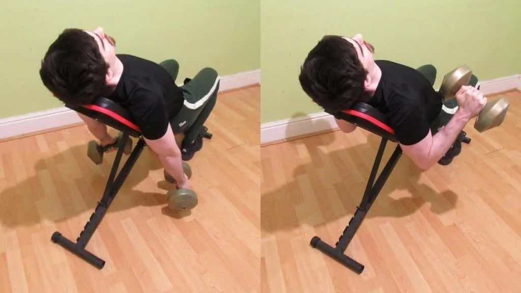 A man doing a reverse incline dumbbell curl