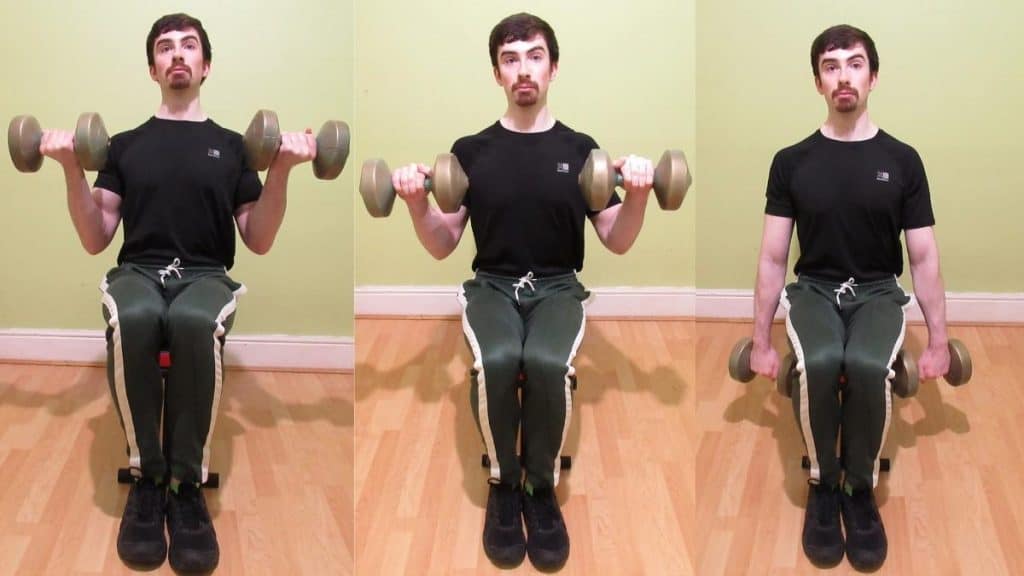A man performing seated Zottman curls