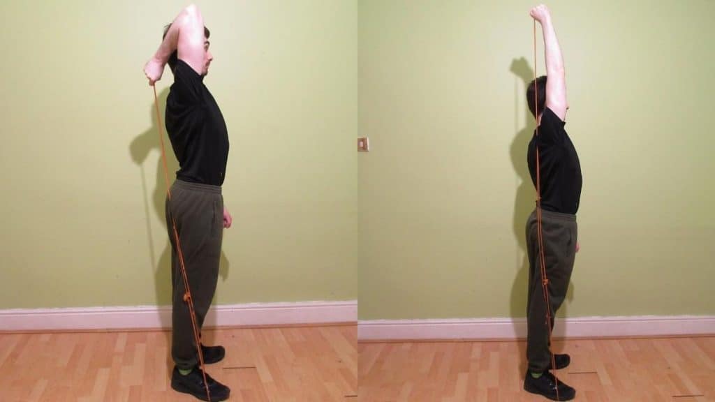 A man doing a single arm resistance band triceps extension