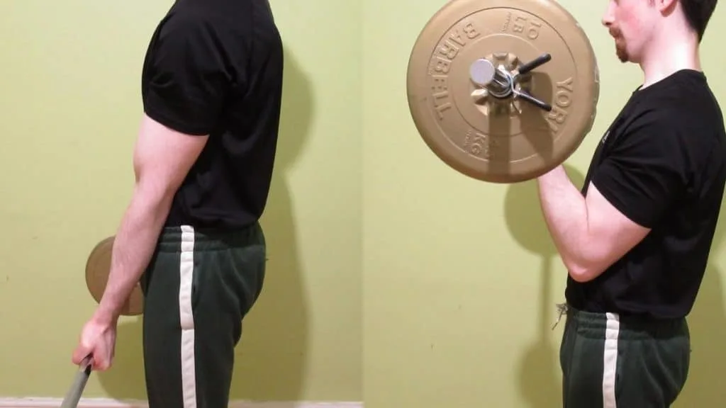 A man doing single arm barbell curls