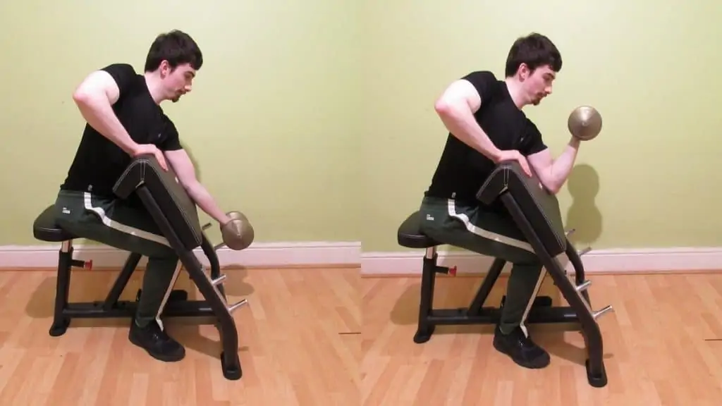 A man performing single arm preacher curls with one dumbbell