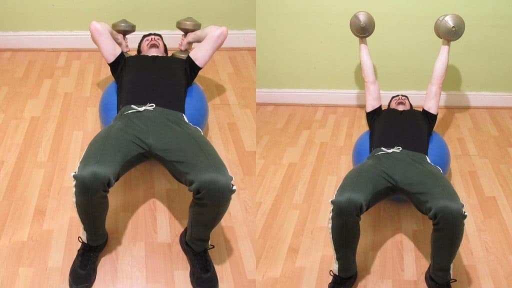A man doing skull crushers on an exercise ball