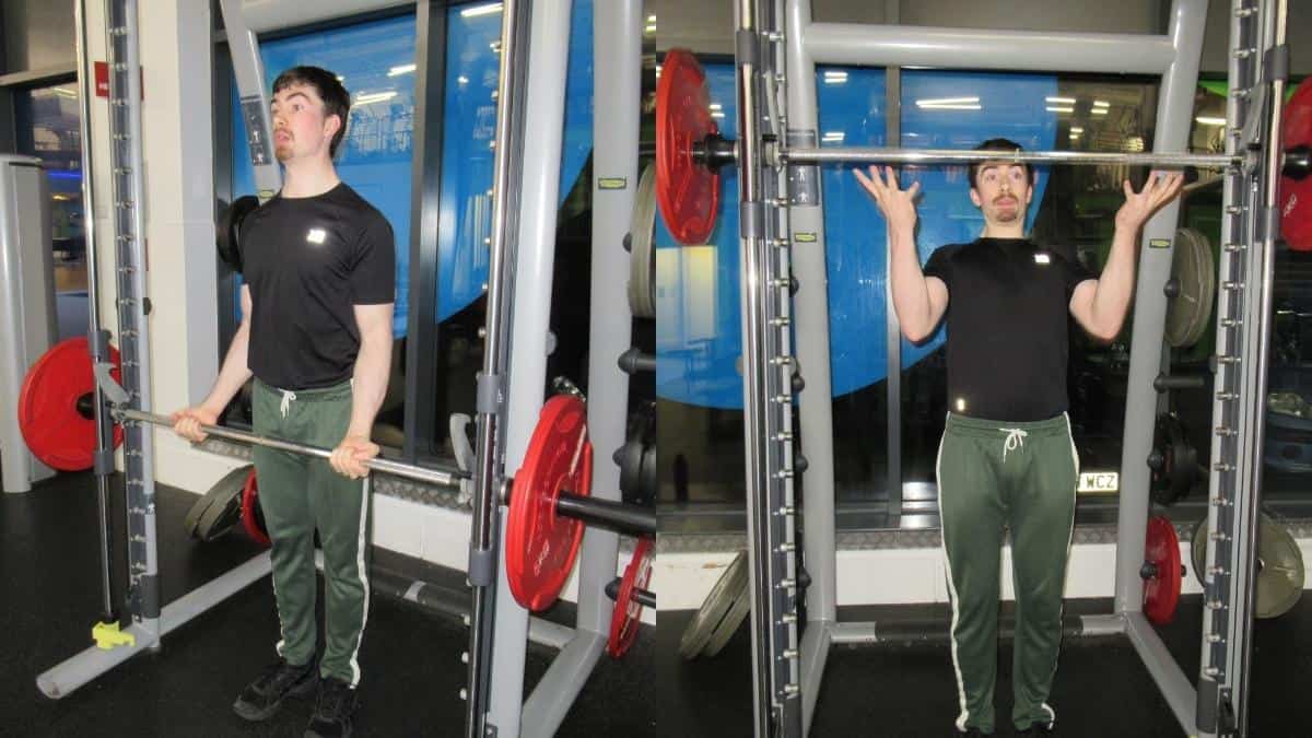 A man performing a Smith machine curl throw to train his biceps
