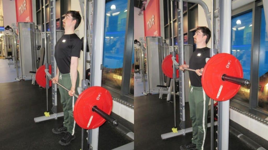 A man performing a Smith machine drag curl for his biceps