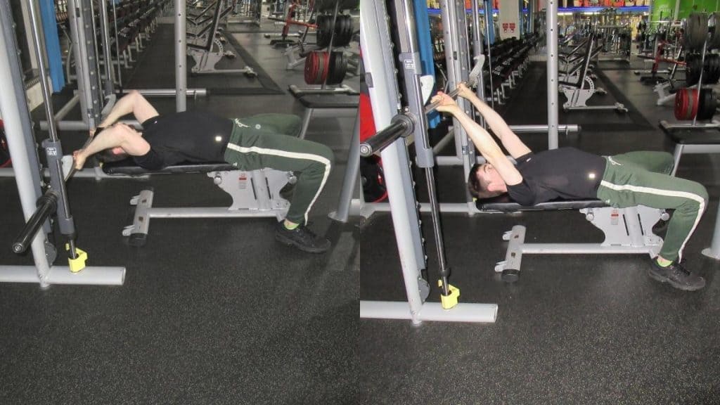 A man doing Smith machine skull crushers for his triceps