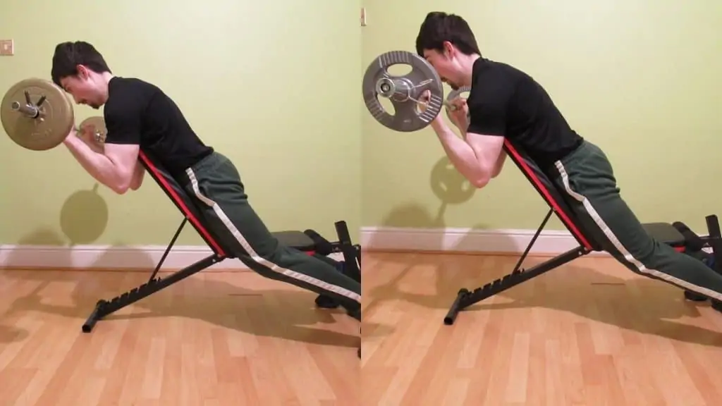 A man demonstrating how to do a spider curl without a preacher bench