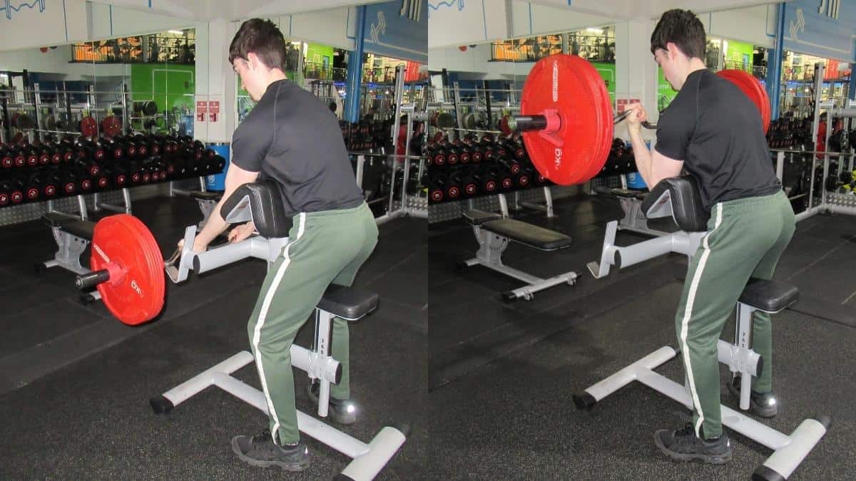A man doing standing preacher curls for his biceps