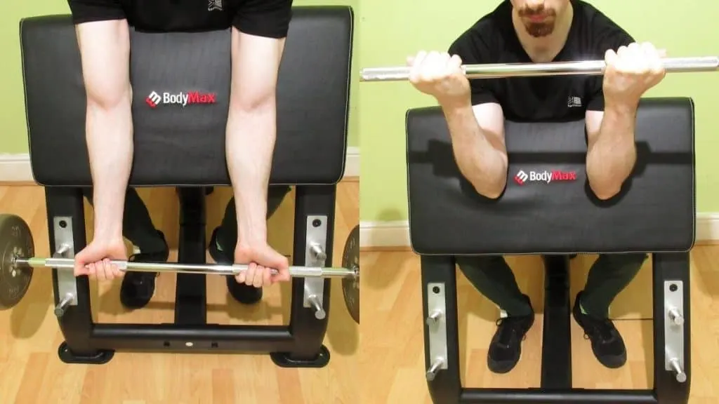 A man performing straight bar preacher curls for his biceps