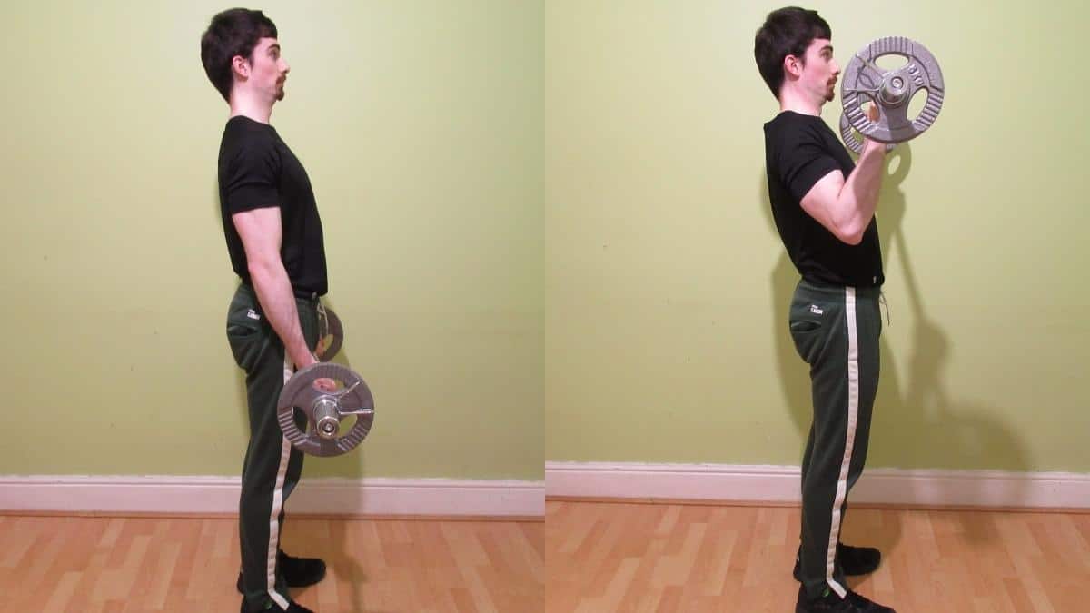 A man doing a standing supinated EZ bar curl for his biceps