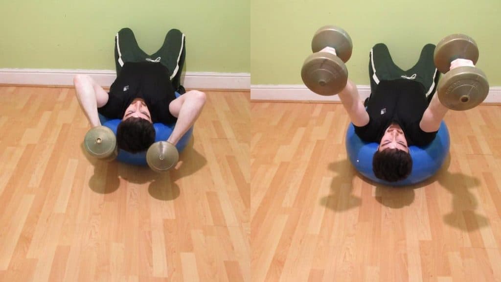 A man doing a Swiss ball lying dumbbell tricep extension