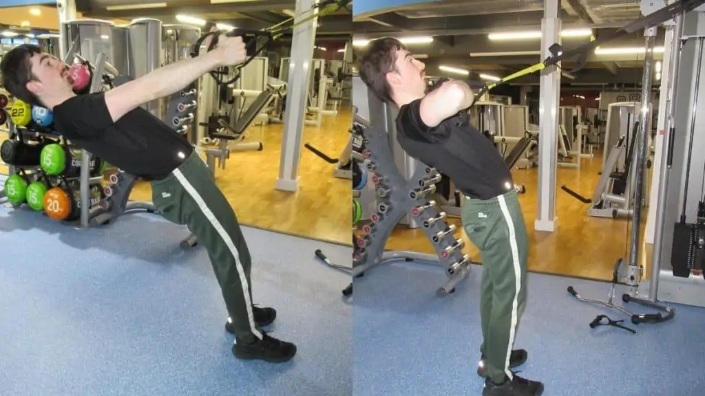 A man doing a TRX bicep clutch curl