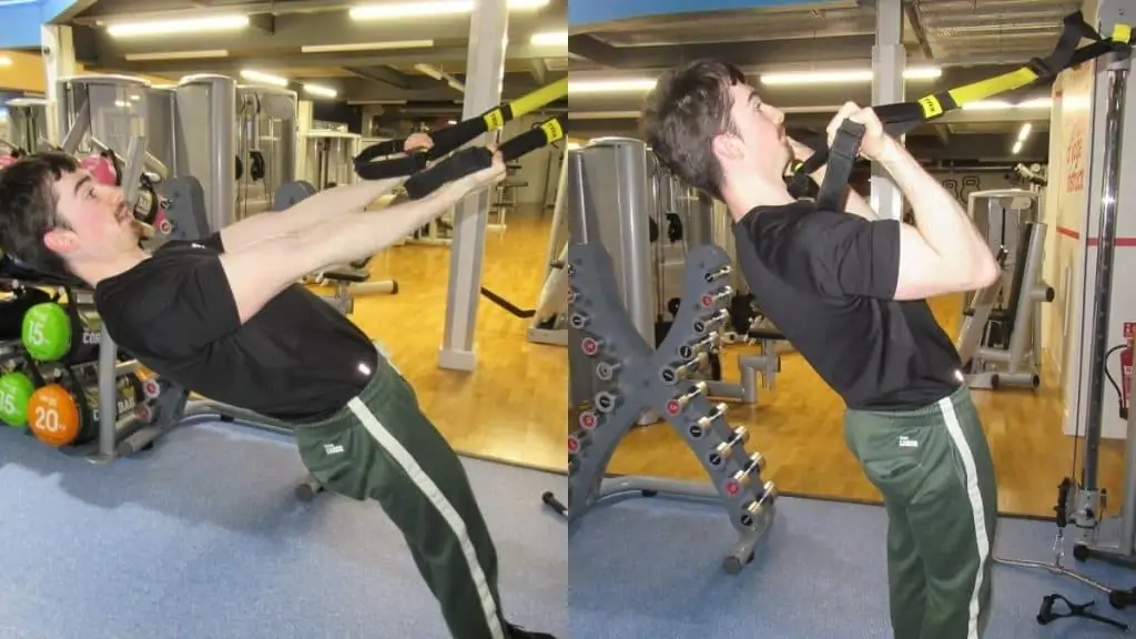 A man performing TRX bicep curls