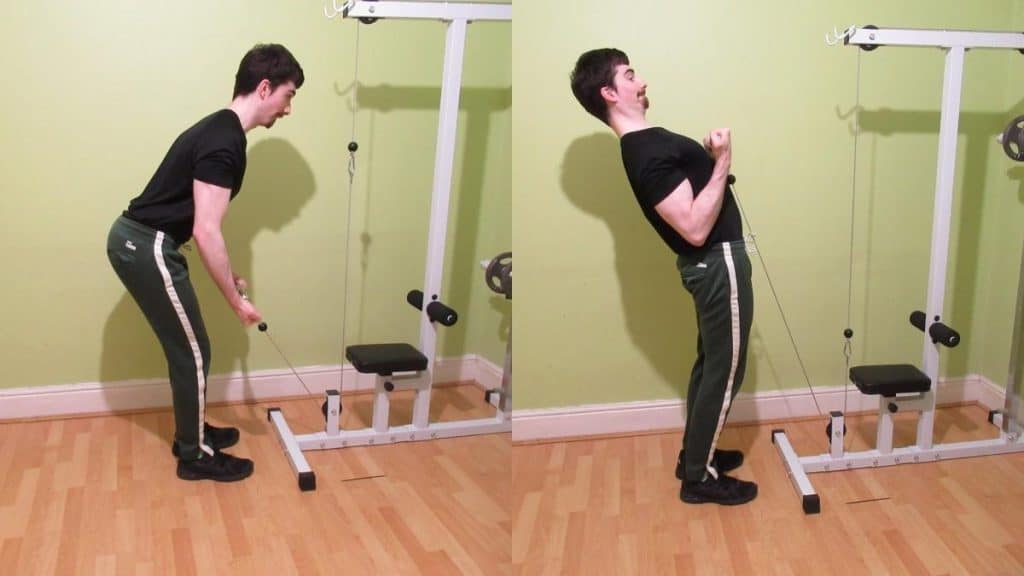 A man making a common two arm cable curl mistake: swinging the weight up with momentum