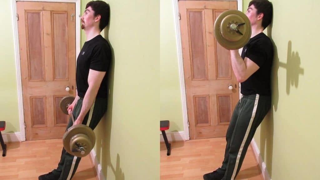 A man doing some wall barbell curls