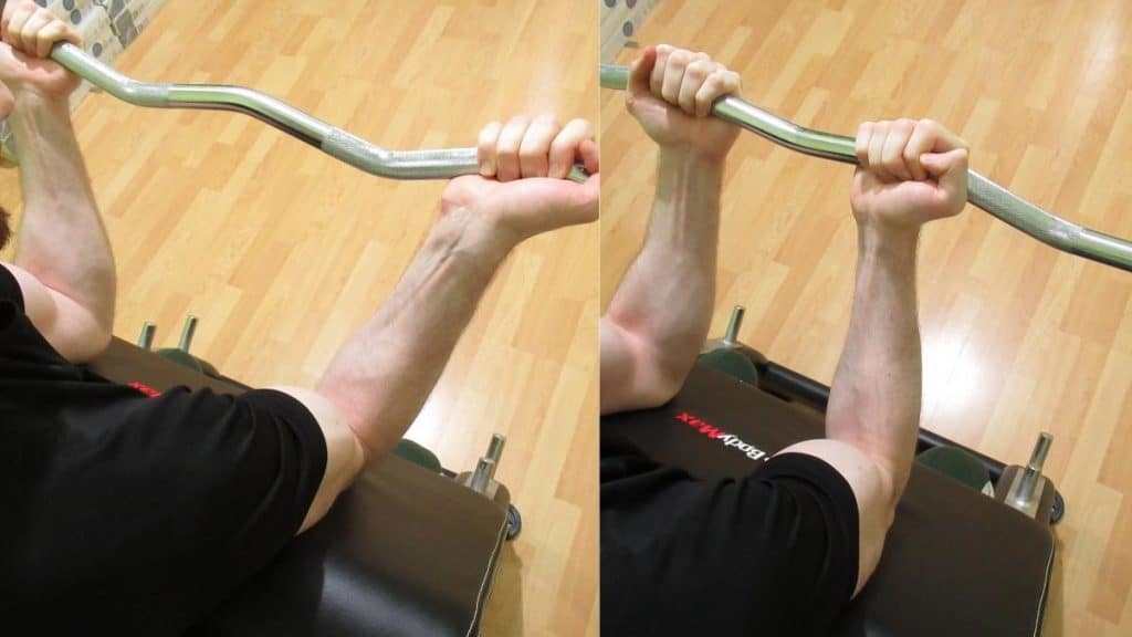 A man doing a wide grip curls vs close grip curls comparison to show the differences