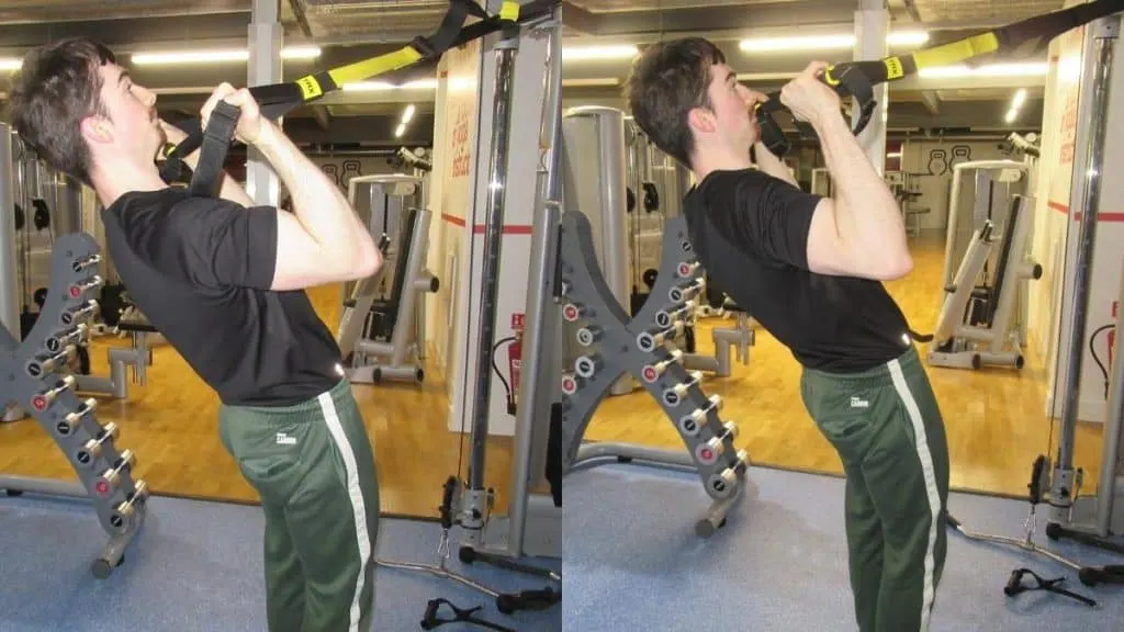 A man doing Zottman curls on the TRX