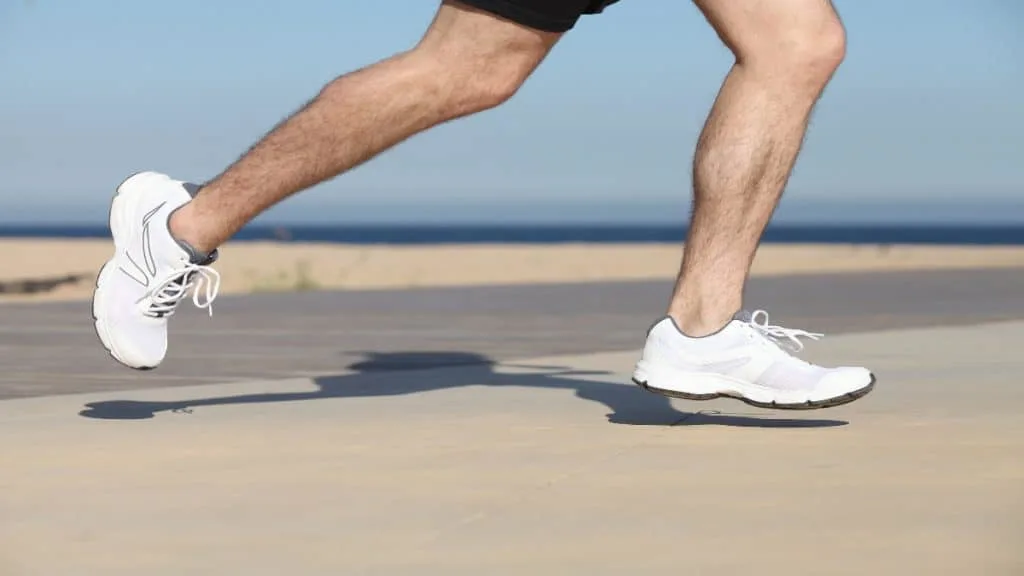 Close up of a runner's 13.5 inch calves