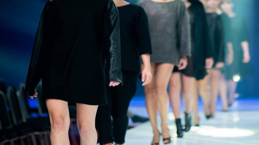 Female fashion models showing their 19 inch legs