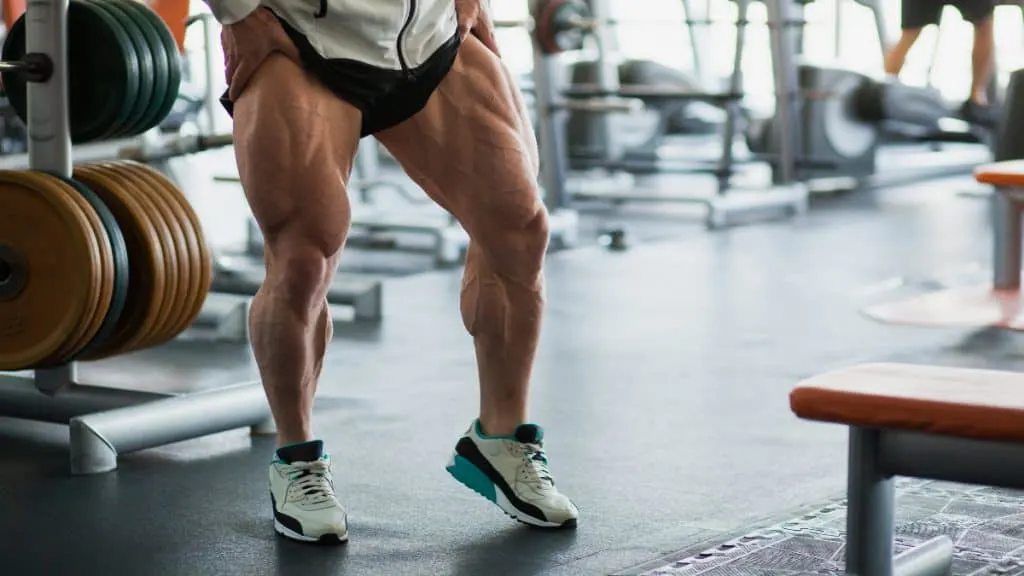 A bodybuilder showing his impressive 20 inch calf circumference