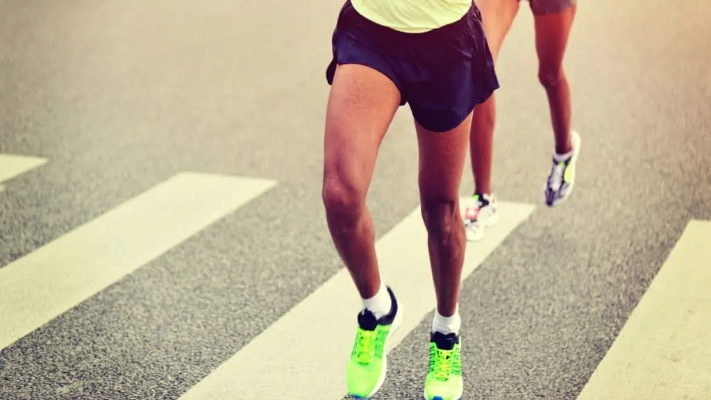 The 20 inch quads of a male runner