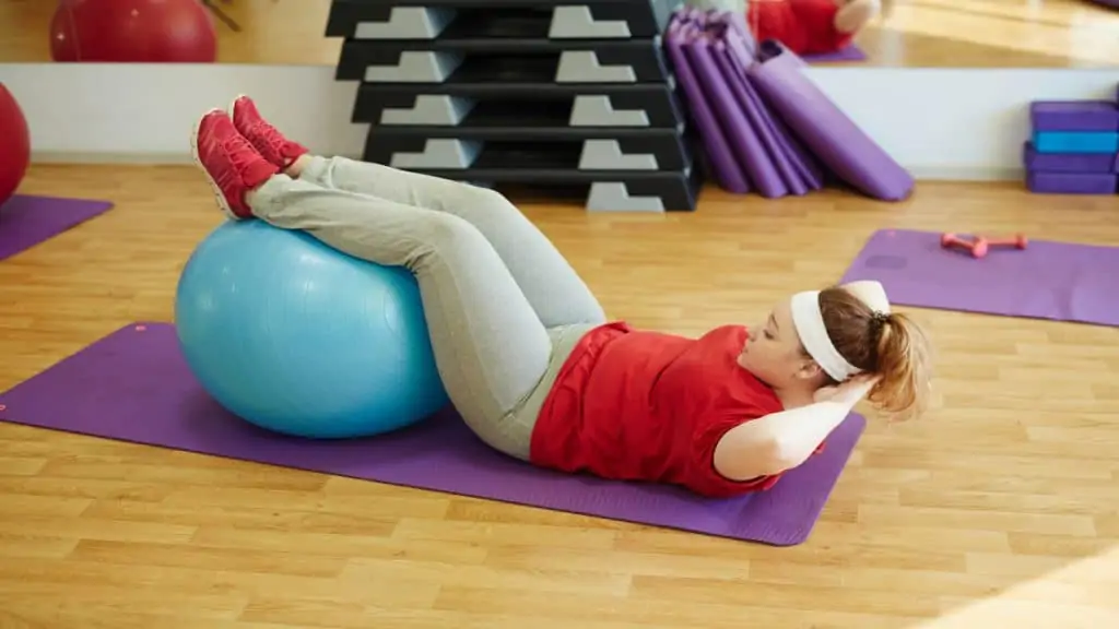 A woman working out her 27 inch thighs