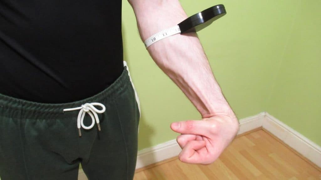 A man showing his above average forearm size