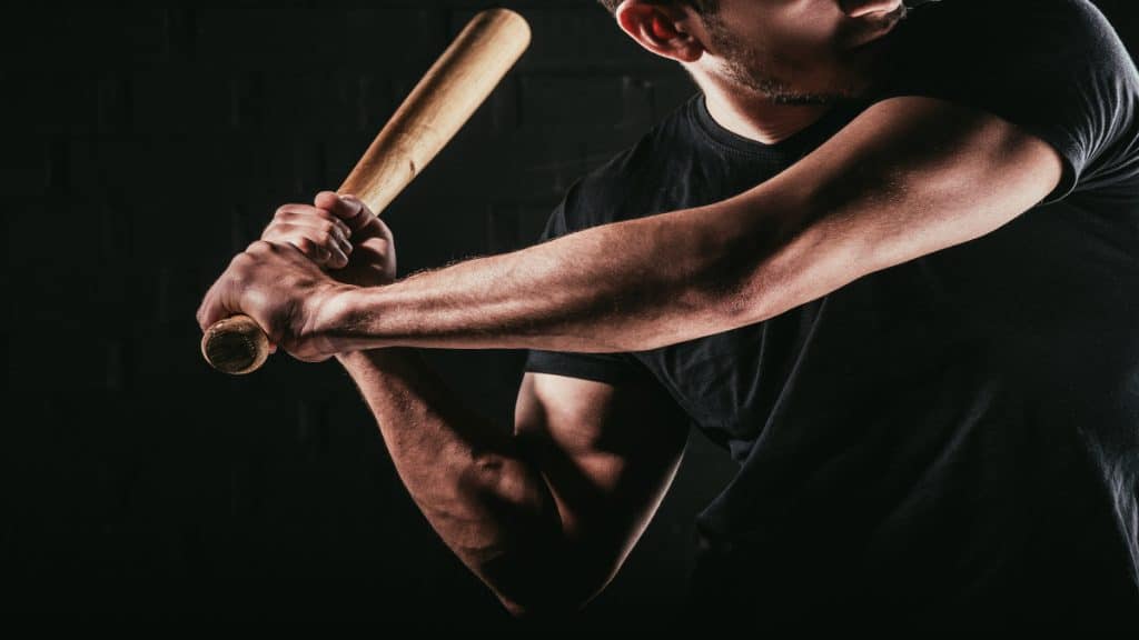 A baseball player holding a bat