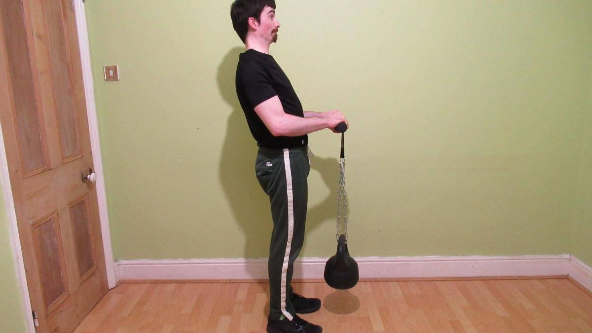 A man using the best wrist roller on the market